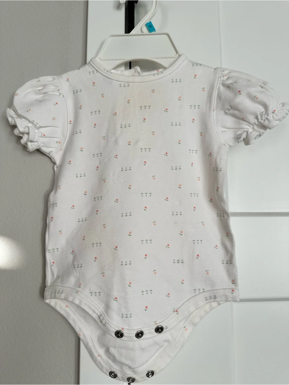 Cherokee baby play-wear. White Baby Onesie with Tiny Pink & Green Floral Print